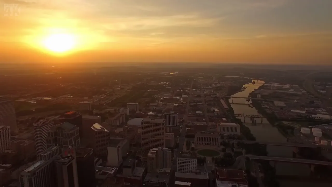 The sun setting over downtown Nashville and the Cumberland River